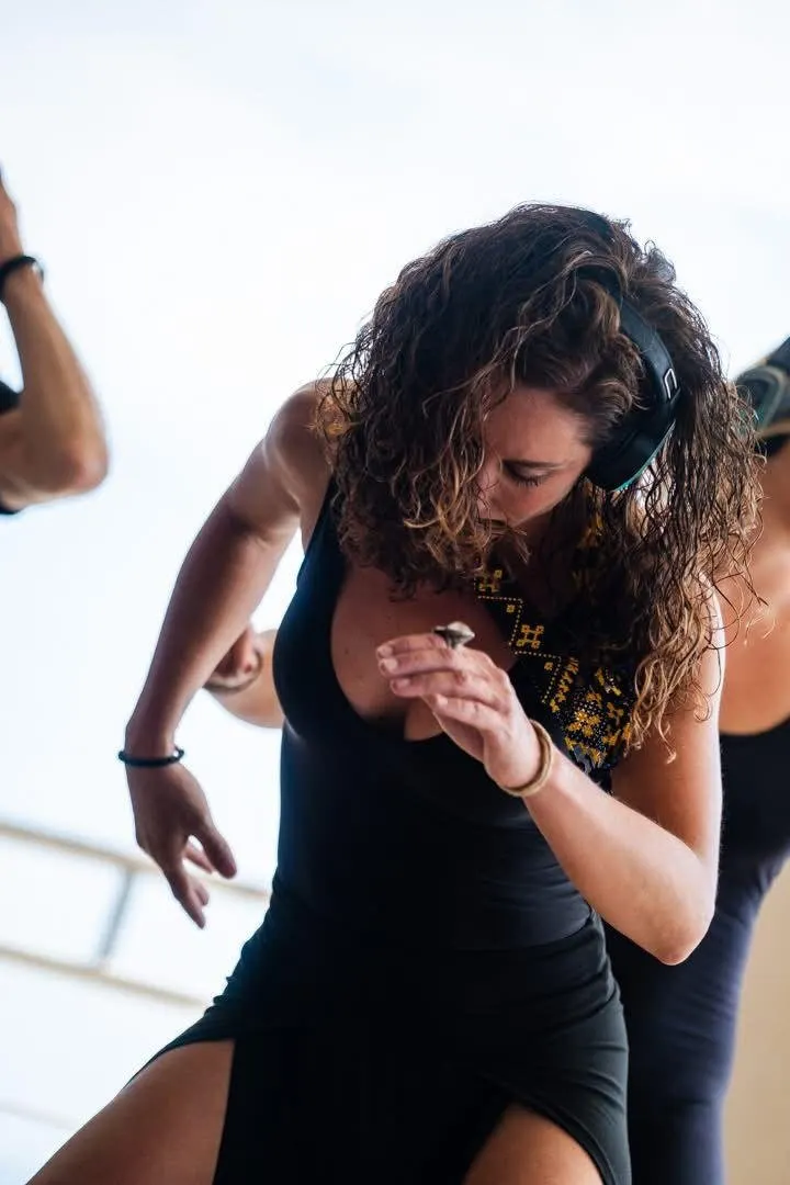 Dancing with headphones during an EMME Journey